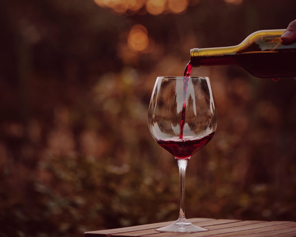 Red wine being poured